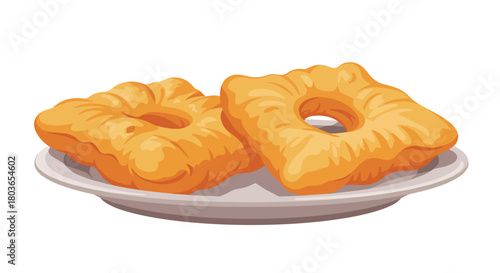 Delicious fried dough pastries served on a white plate ready to eat.