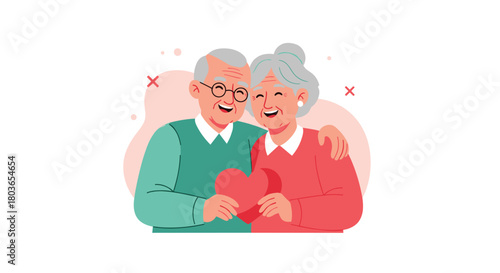 Happy elderly couple holding a red heart together smiling and embracing.