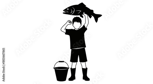 Victorious young fisherman holds up his catch with pride outdoors