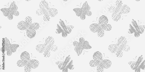 Gray grunge butterfly silhouettes on a light gray background. Endless texture with abstract worn and scratched insect. Vector seamless pattern for wrapping paper, giftwrap, surface texture or printing