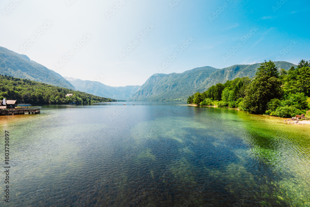 Fototapeta premium Bohinj lake in Julian Alps. Bohinj Lake, Church of St John the Baptist in Triglav National Park, Julian Alps, Slovenia