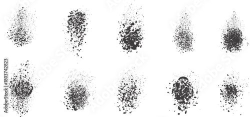 Black ink splatter and spray texture set featuring various grunge blot shapes on a white background. High-contrast scattered droplet patterns ideal for overlays, brush effects, and artistic design pro