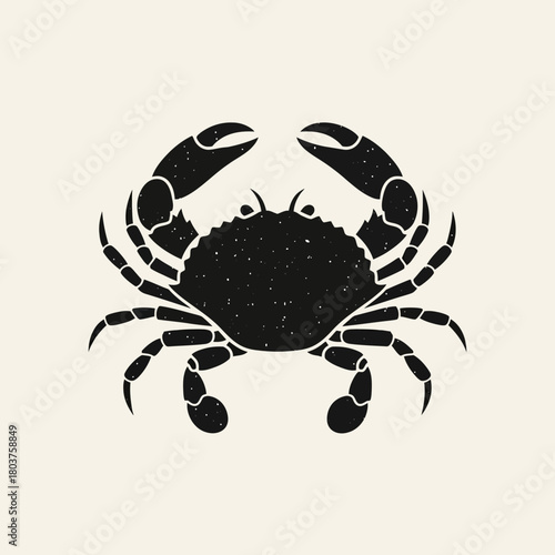 Stylized black silhouette of a crab with textured details.