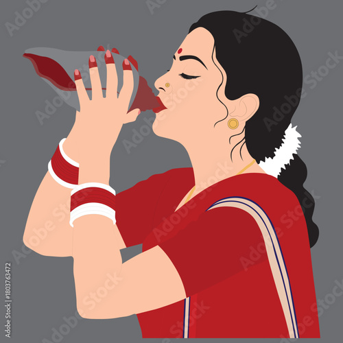 Indian woman blowing conch shell for spiritual ritual and celebration