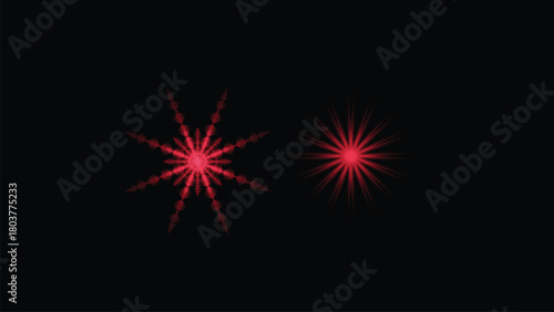 Two abstract glowing red starbursts or fireworks against a dark black background