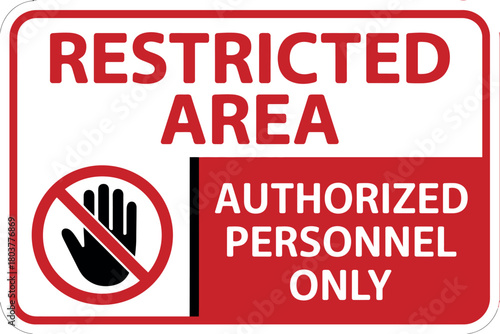 A red and white sign warns that the area is restricted to authorized personnel only, with a prohibition symbol.