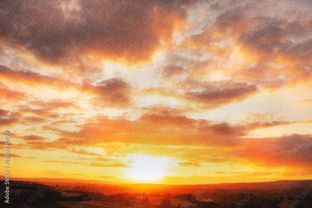 Fototapeta premium Dramatic Sunset Sky with Fiery Clouds and Vibrant Golden Horizon. Colorful Evening Landscape, Dramatic Light, Atmospheric Cloudscape, Nature Background Photography
