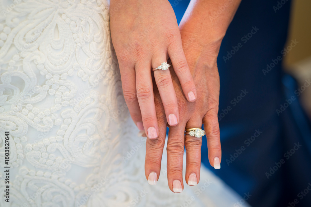 Fototapeta premium Mother and Daughter Showing Matching Diamond Rings