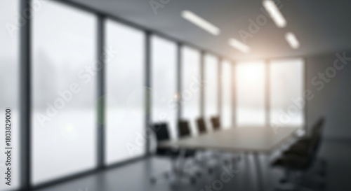 Blurred Modern Conference Room with Large Windows and Bright Light.