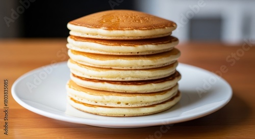 Wallpaper Mural Delicious stack of golden brown pancakes on a white plate for breakfast. Torontodigital.ca