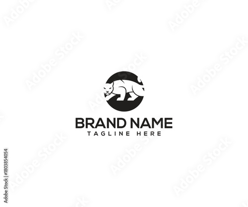 Illustration Logo: A symbolic emblem featuring a stylized bear silhouette set within a circular frame, conveying strength and stability, perfect for branding.