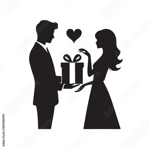 Couple exchanging a gift silhouette