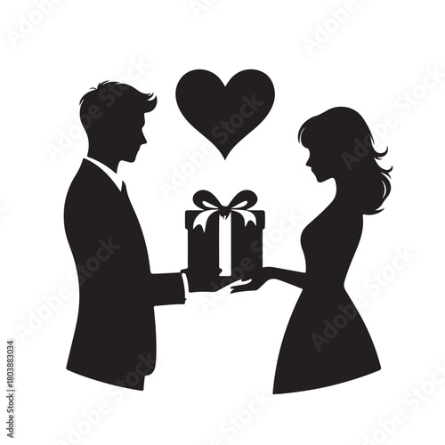 Couple exchanging a gift silhouette