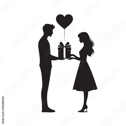 Couple exchanging a gift silhouette