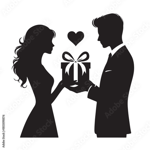 Couple exchanging a gift silhouette