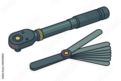Essential mechanical tools including a torque wrench and feeler gauges for automotive precision work