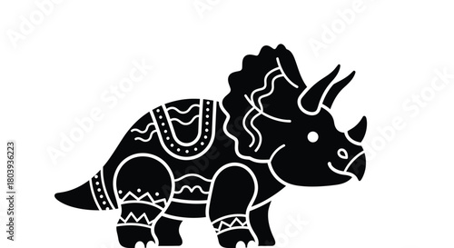 Whimsical black triceratops illustration with decorative tribal patterns