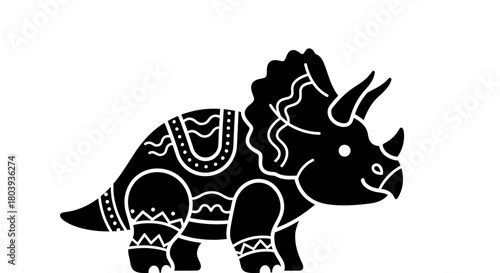 Whimsical black silhouette of a decorative triceratops dinosaur with tribal patterns