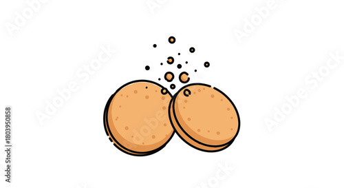 Two cookies with crumbs floating above them.