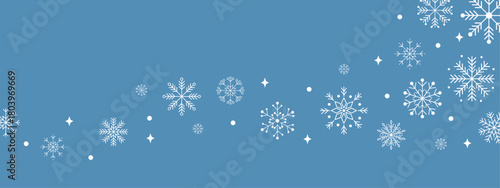 Winter snowflakes on a blue background. Minimal geometric white snowflakes, elegant seasonal banner for Christmas, New Year, and winter design projects.