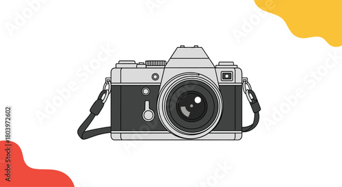 Vintage camera captures memories focusing on the main subject with precision.