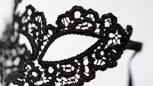 Elegant Black Lace Masquerade Mask Close-Up for Festive Occasions.