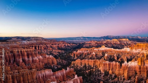 Bryce Canyon National Park Hoodoos at Sunrise with Pink and Blue Sky Keywords: Bryce Canyon, national park, hoodoos, rock formations