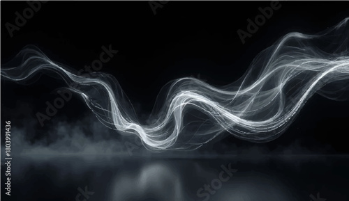 Smooth flowing smoke swirling on a dark black background