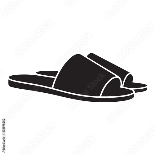 A pair of black slippers isolated on white background, perfect for relaxing at home or by the pool on a summer day