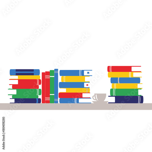 Stacks of colorful books and a cup of coffee on a shelf.