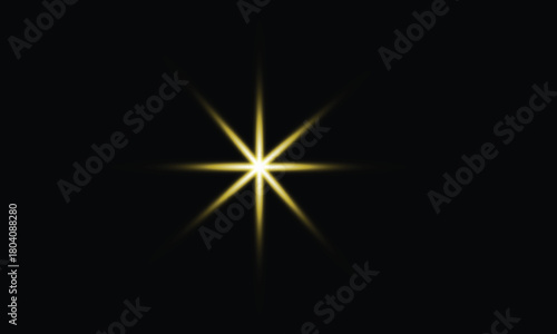 Bright golden starburst with eight sharp rays emanating from a central point on a black background