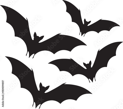 A collection of five flying bat silhouettes for Halloween design elements