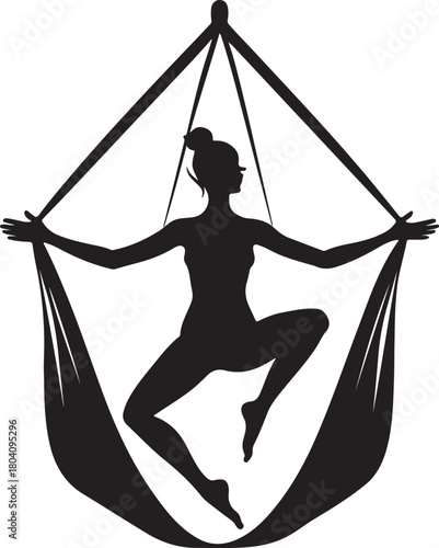 Aerial yoga pose, black silhouette of a woman suspended in a silk hammock