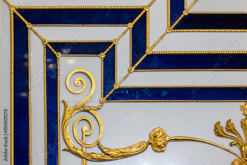 Luxurious gold and cobalt blue decorative frame featuring concentric squares