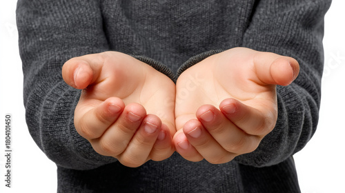 Close-up of a child's open hands cupped together, suggesting a gesture of offering or holding something precious