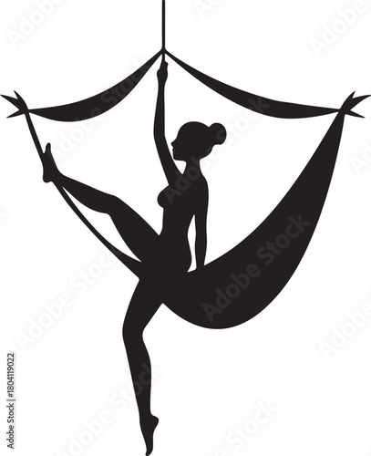 Aerial yoga pose, black silhouette of a woman suspended in a silk hammock