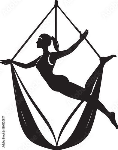 Aerial yoga pose, black silhouette of a woman suspended in a silk hammock