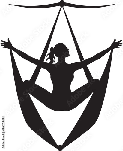 Aerial yoga pose, black silhouette of a woman suspended in a silk hammock