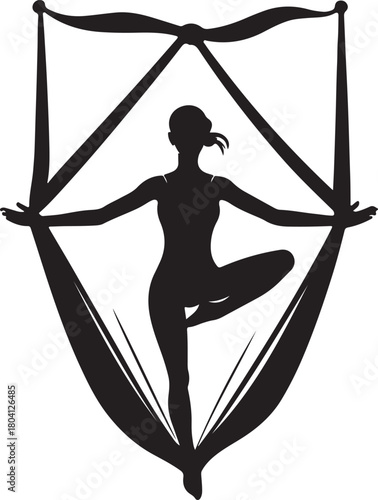 Aerial yoga pose, black silhouette of a woman suspended in a silk hammock