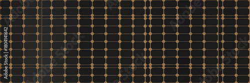 A close up view of a solar panel showing the individual cells and grid pattern in a repeating arrangement