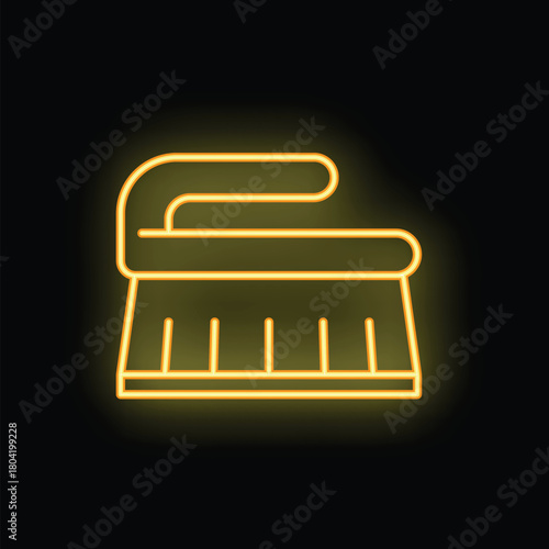 Neon sign of a scrubbing brush is glowing on a dark background