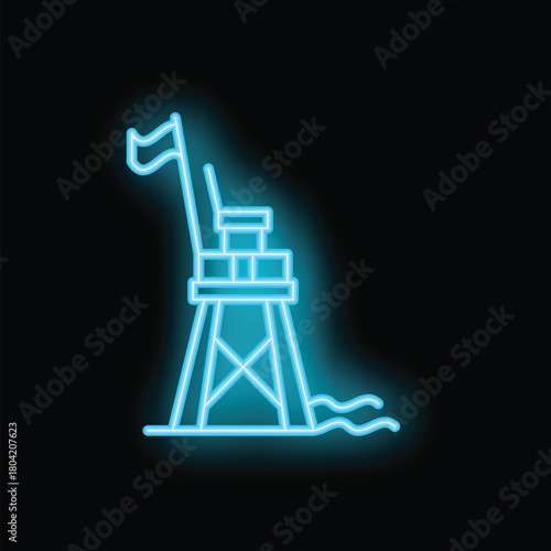 Blue neon sign of a lifeguard tower standing on the beach at night, a symbol of safety and security