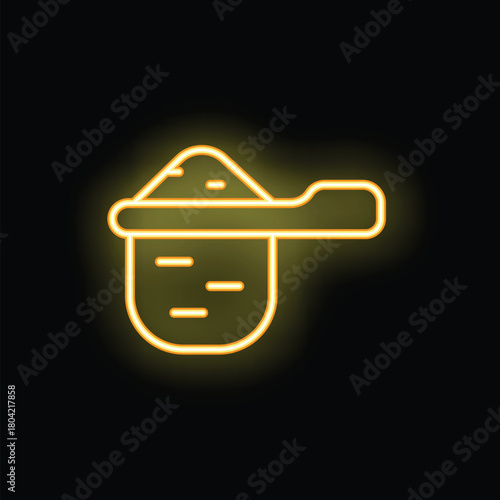 Yellow neon glowing symbol of a tea infuser strainer with tea leaves on a black background