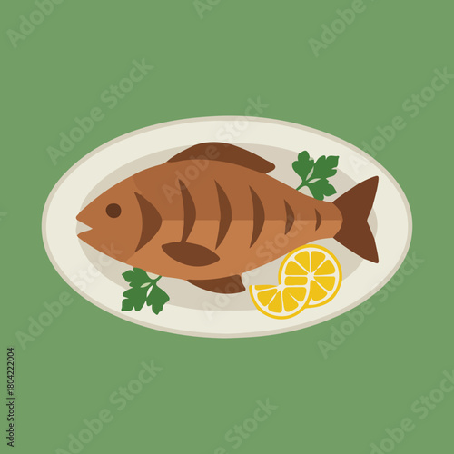 A brown cooked fish on a white oval plate with parsley and two lemon slices against a green background provides a delightful meal.