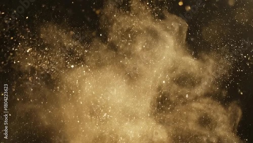 Golden Glitter Explosion on Black Background.