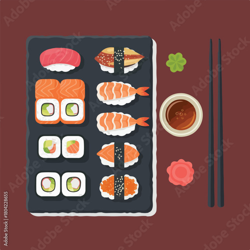 Overhead shot of a gray slate tray with assorted sushi including rolls, nigiri, and accompaniments of wasabi, ginger, soy sauce, and chopsticks on a brown background.