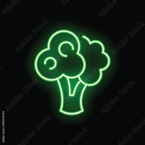 Green neon sign illuminating in the dark, representing a broccoli vegetable, promoting healthy food and vegan lifestyle