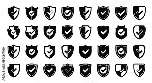 Collection of black shield icons with checkmarks and arrows displayed