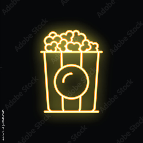 Neon sign of a bucket overflowing with popcorn, illuminating the night with a warm, inviting glow
