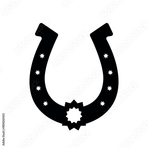 Horseshoe silhouette with starburst detail, lucky charm black vector icon